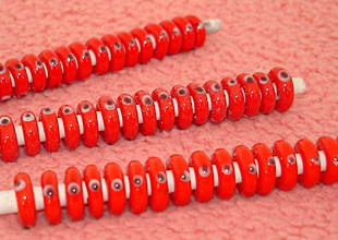 Red color eye design spacer beads